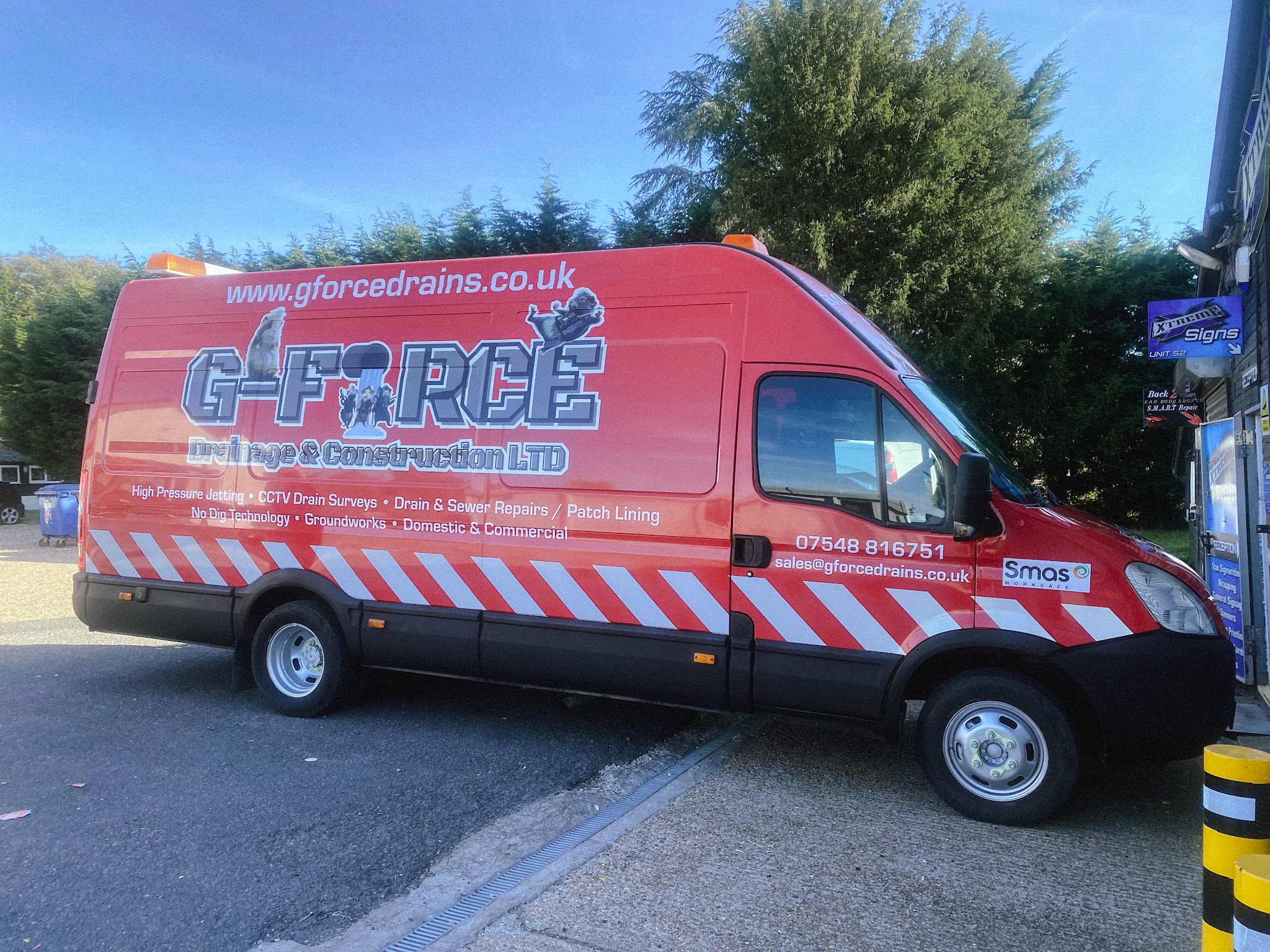 G-Force long wheelbase van in full red livery